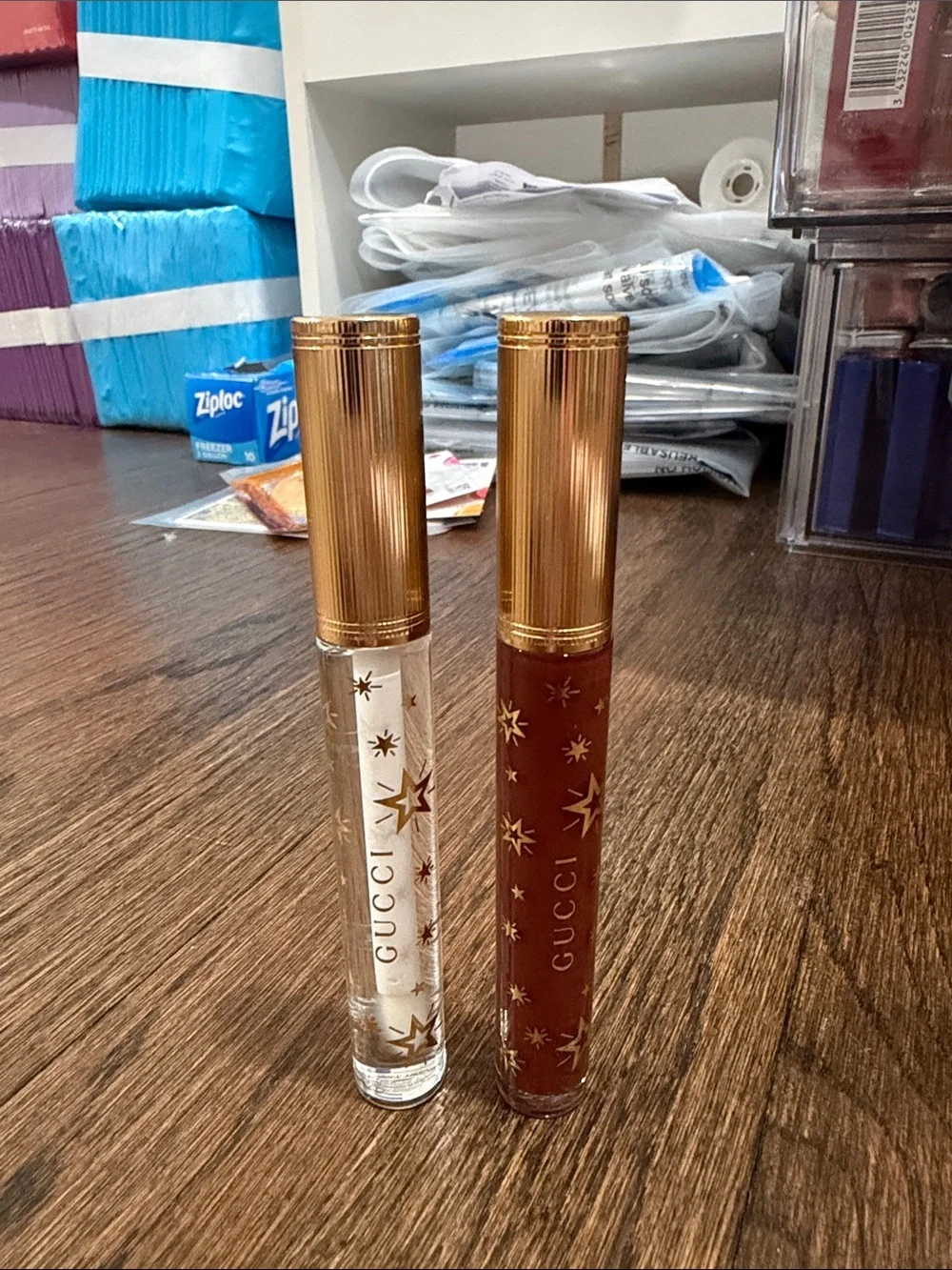Gucci  plumping Lip Gloss Duo in Clear & Deep Brown